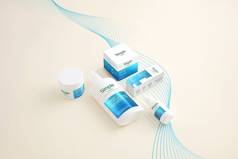 Simple Active Skin Barrier Care range, CGI rendered jar, pump bottle, serum and cartons, composited onto a cream set with flowing blue line graphics